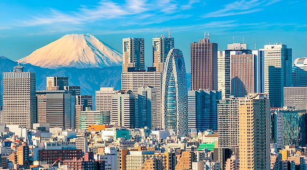 Mount Fuji watches over the Tokyo skyline.