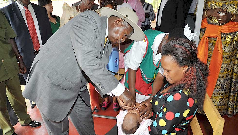 President Museveni visits a mother and her baby. Maternal and neonatal health indicators are improving in the country.