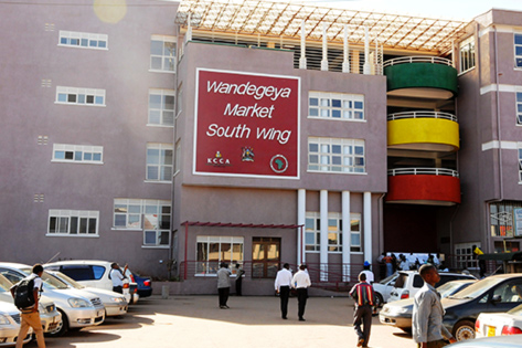 Shoppers outside Wandegeya Market, Kampala. The market was opened by President Museveni in 2013 and accommodates more than 1,200 vendors.